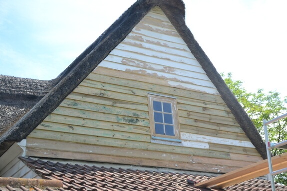 timber cladding replacement Grade 2 listed building