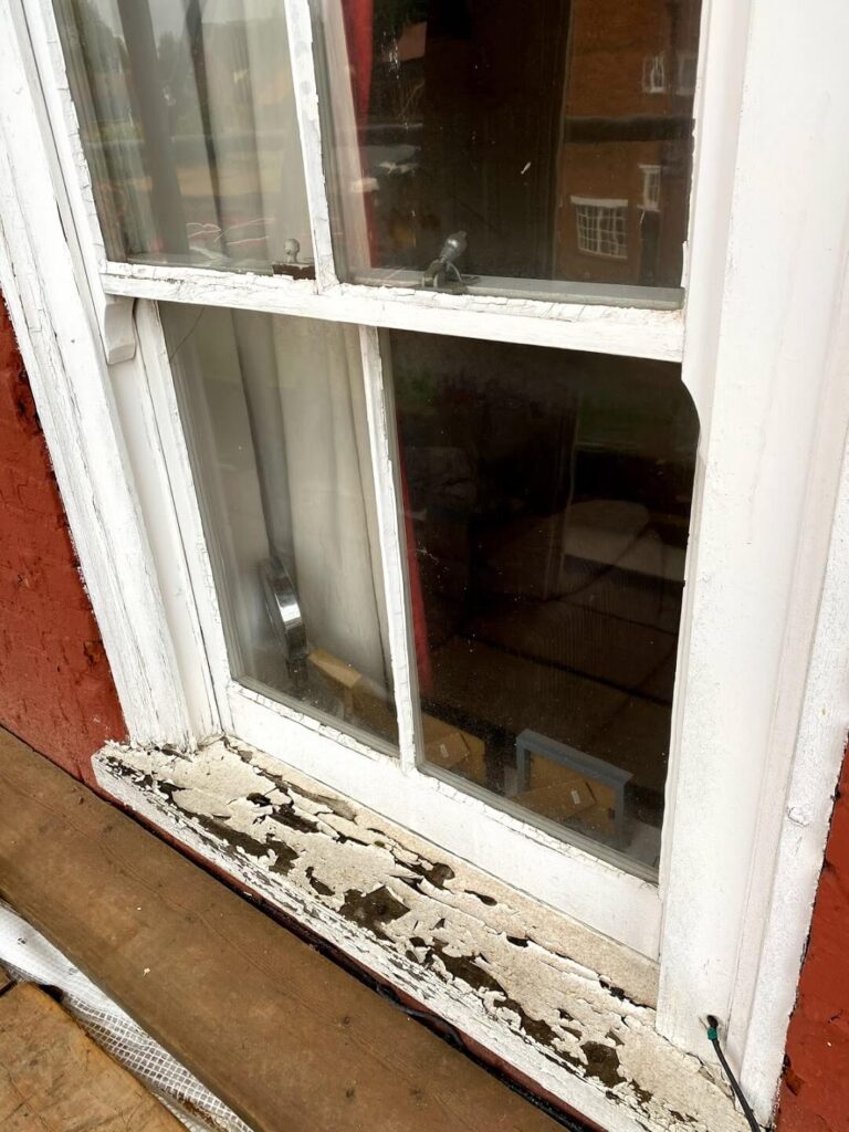 Flaking paint on window sills