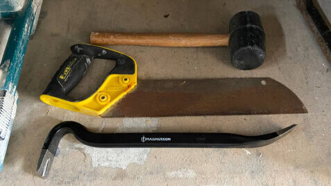 Сrowbar, hammer and hand saw