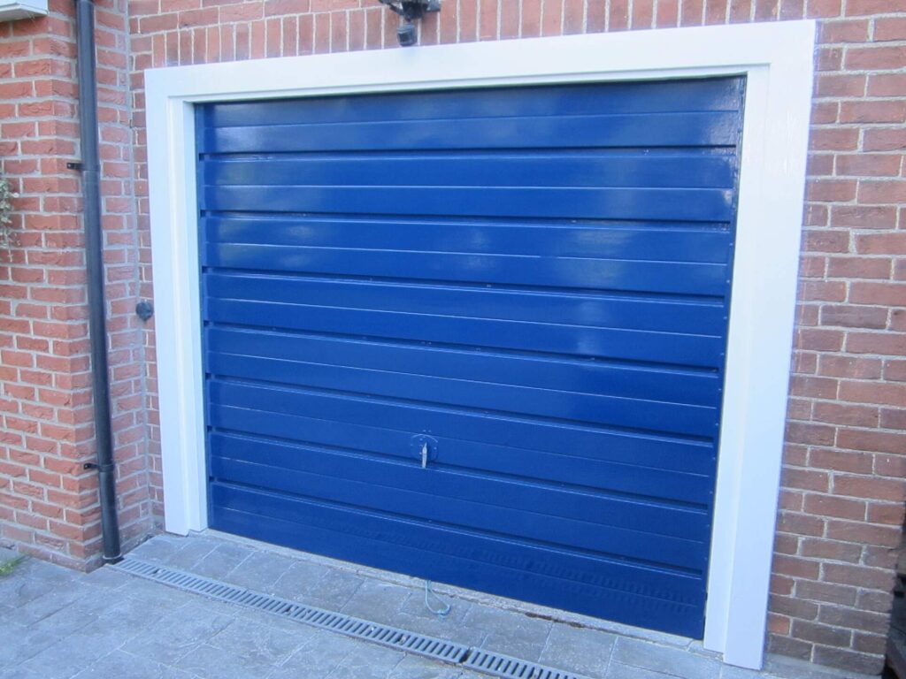 Priming and painting the garage door