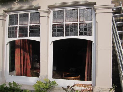 Half Georgian sash window with stained glass