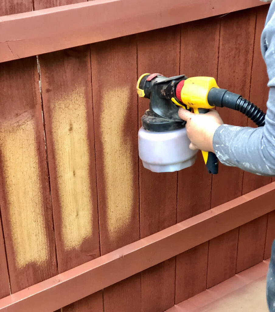 spray painting fence