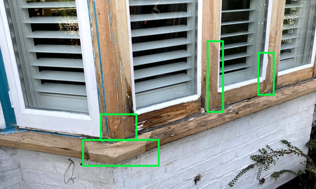 Rotten wooden window frames 