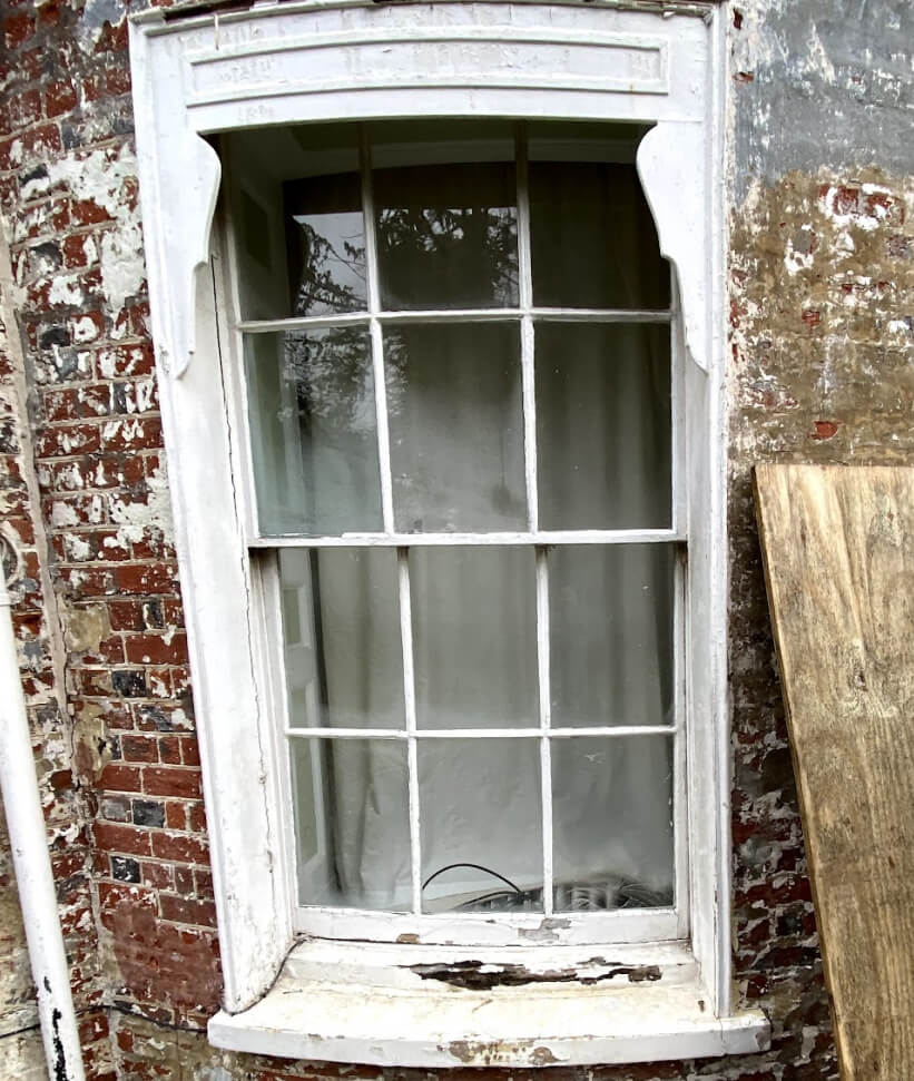 Curved 6 over 6 sash window