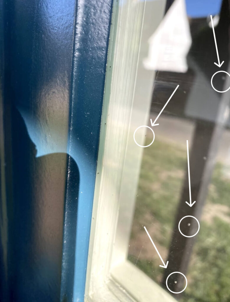 Micro spacers in vacuum insulated glass