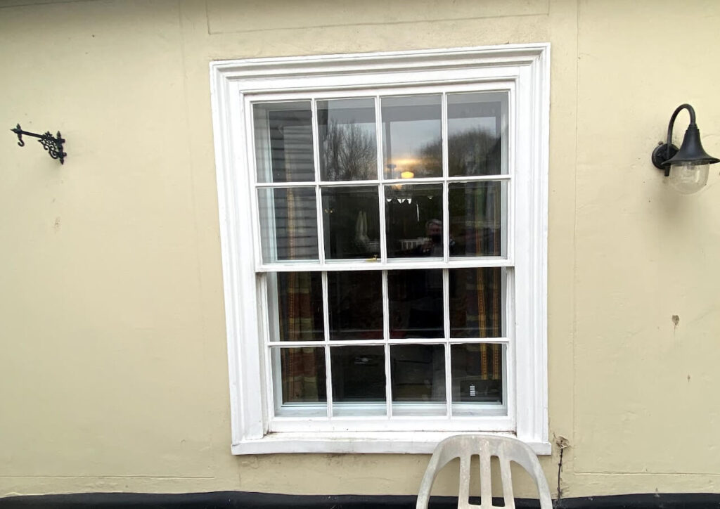 Vertical sliding secondary installed into sash window